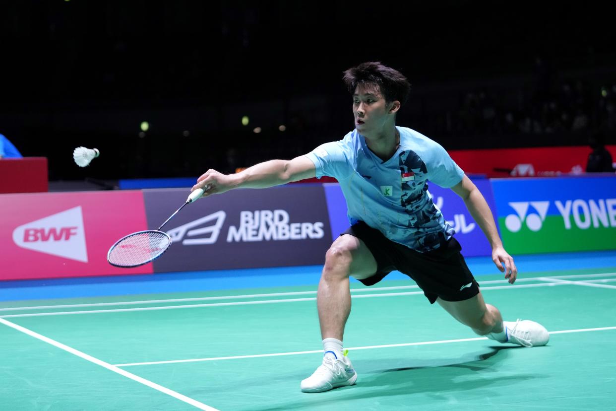 Singapore shuttler Loh Kean Yew hits a return at the 2022 Japan Open in Osaka. 