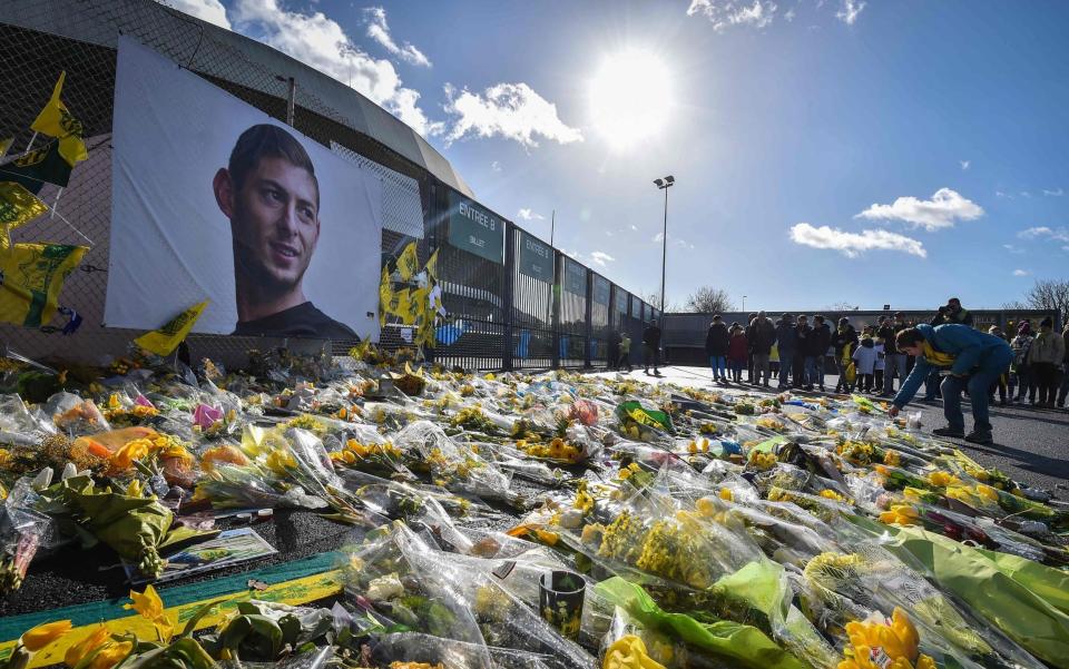 Tributes to the footballer at his former club Nantes' football ground - AFP