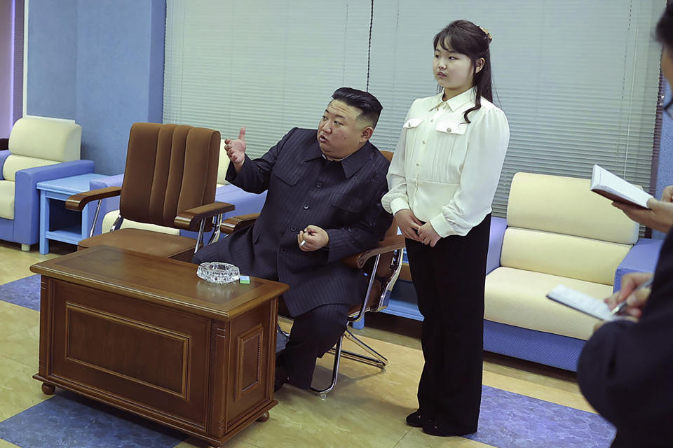 In this photo provided by the North Korean government, North Korean leader Kim Jong Un, and his daughter visit the National Aerospace Development Administration in North Korea Tuesday, April 18, 2023. Independent journalists were not given access to cover the event depicted in this image distributed by the North Korean government. The content of this image is as provided and cannot be independently verified. (Korean Central News Agency/Korea News Service via AP)