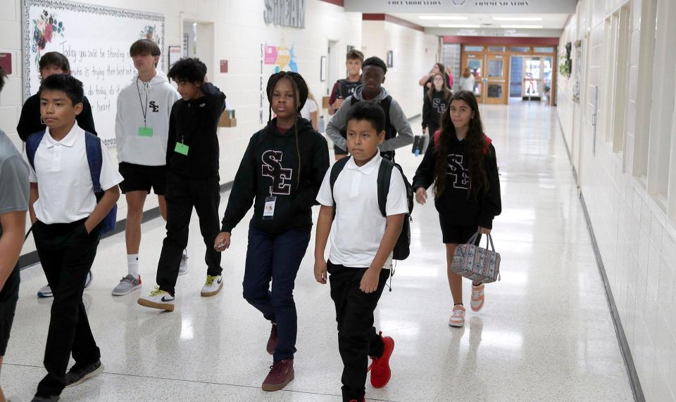 Students arrive for the first day of school Thursday morning at South Effingham Middle School.