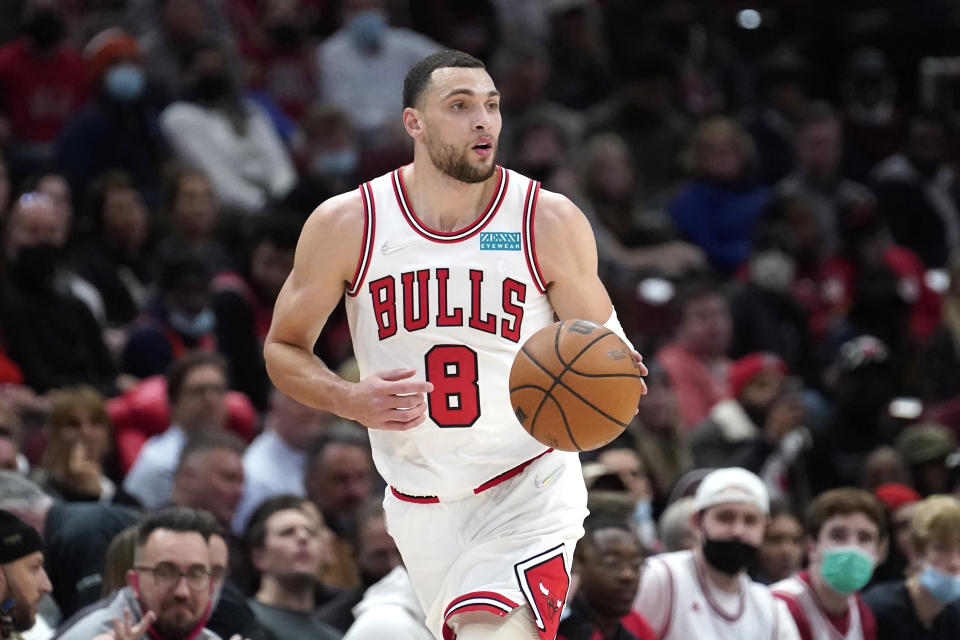 FILE - Chicago Bulls' Zach LaVine starts a fast break during the first half of an NBA basketball game against the Atlanta Hawks Thursday, Feb. 24, 2022, in Chicago. The Chicago Bulls remain hopeful All-Star guard Zach LaVine will choose to re-sign with them rather than join another team as an unrestricted free agent, executive vice president of basketball operations Arturas Karnisovas said Monday, June 27, 2022. (AP Photo/Charles Rex Arbogast, File)