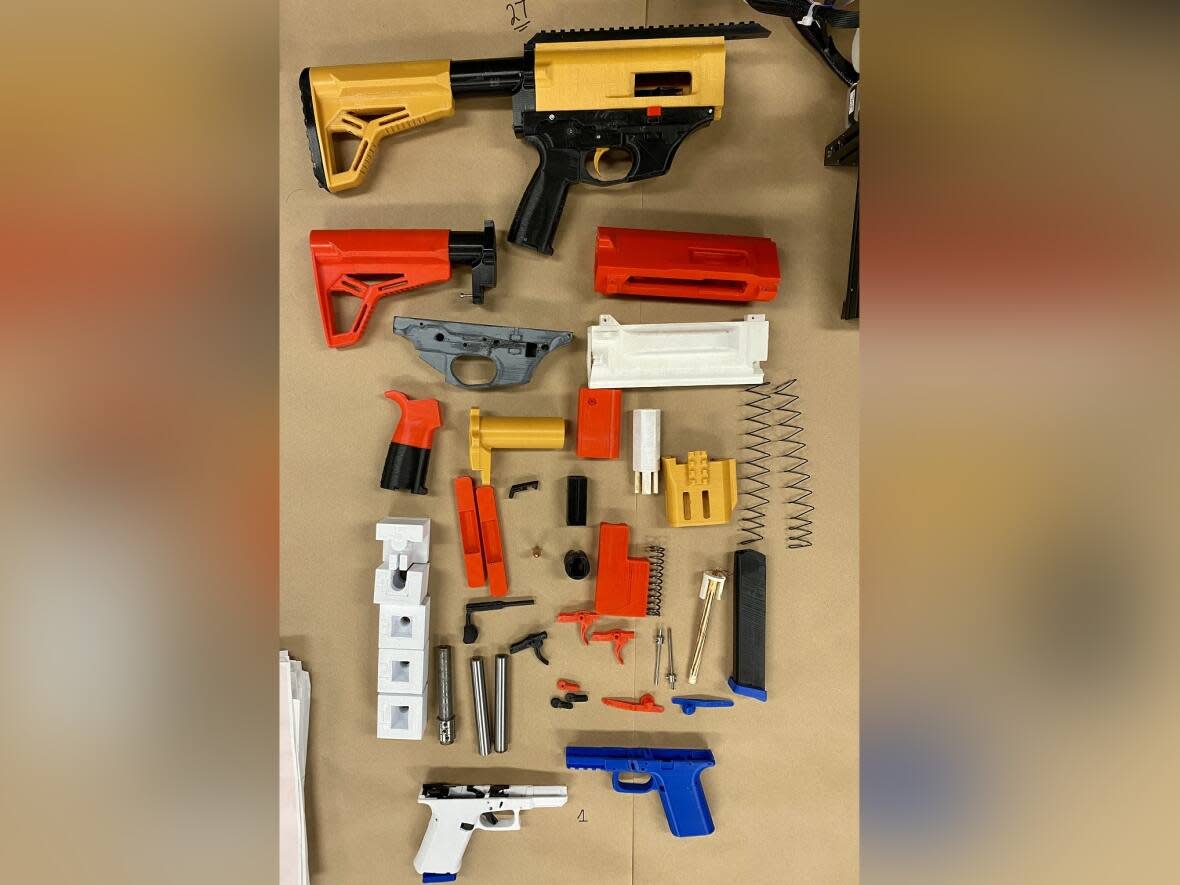 Saskatoon police say their guns and gangs unit seized guns and components made with 3-D printing technology. A man, 46, faces several charges. (Submitted by Saskatoon Police Service - image credit)