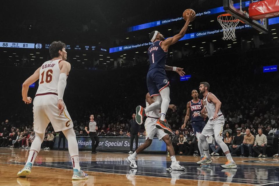 Brooklyn Nets forward Bruce Brown (1) drives to the basket during the second half of an NBA basketball game against the Cleveland Cavaliers Friday April 8, 2022, in New York. (AP Photo/Bebeto Matthews)