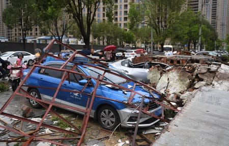 Cars are damaged after typhoon Lekima made landfall in Wenling, Zhejiang