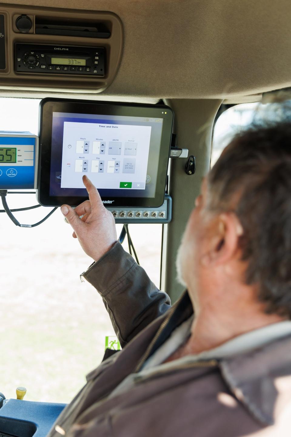 Jim Isley sits inside equipment on his sixth-generation family farm, located near Palmyra Township and about 25 miles from the shores of western Lake Erie. Jim operates Sunrise Farms with his wife,
Laurie Isley, and their youngest son, Jake. The farm was recognized in 2021 as an American Soybean Association Conservation Legacy Award recipient.