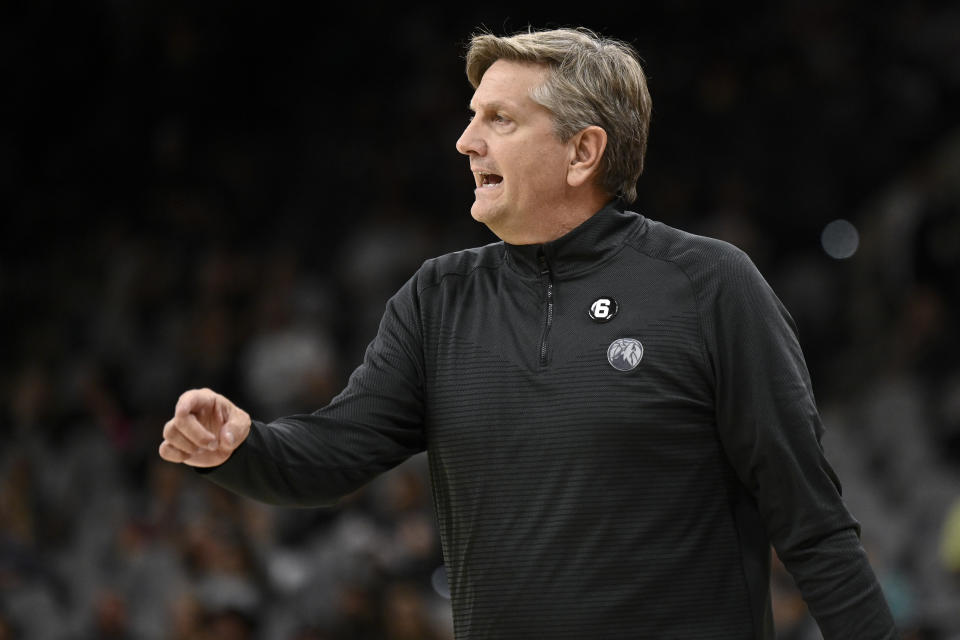 Minnesota Timberwolves head coach Chris Finch yells to his players during the first half of an NBA basketball game against the San Antonio Spurs, Sunday, Oct. 30, 2022, in San Antonio. (AP Photo/Darren Abate)