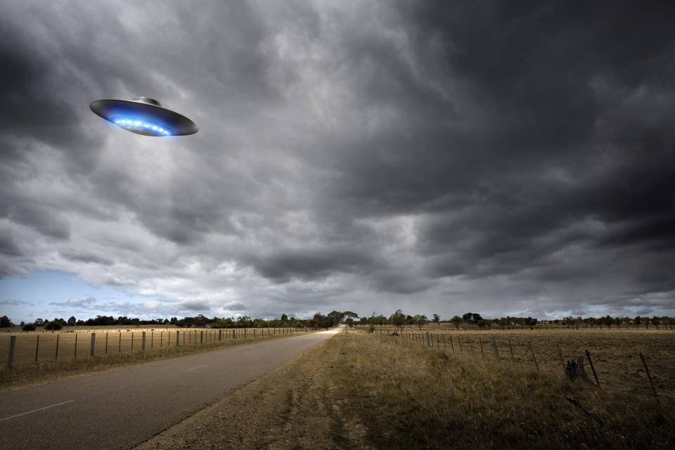 A UFO flying down a field