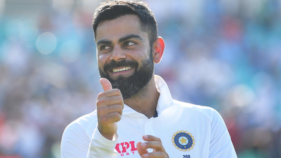 Virat Kohli angered some English cricket fans with his mockery of the Barmy Army during India's fourth Test victory, but was defended by cricket great Michael Vaughan. (Photo by Gareth Copley/Getty Images)