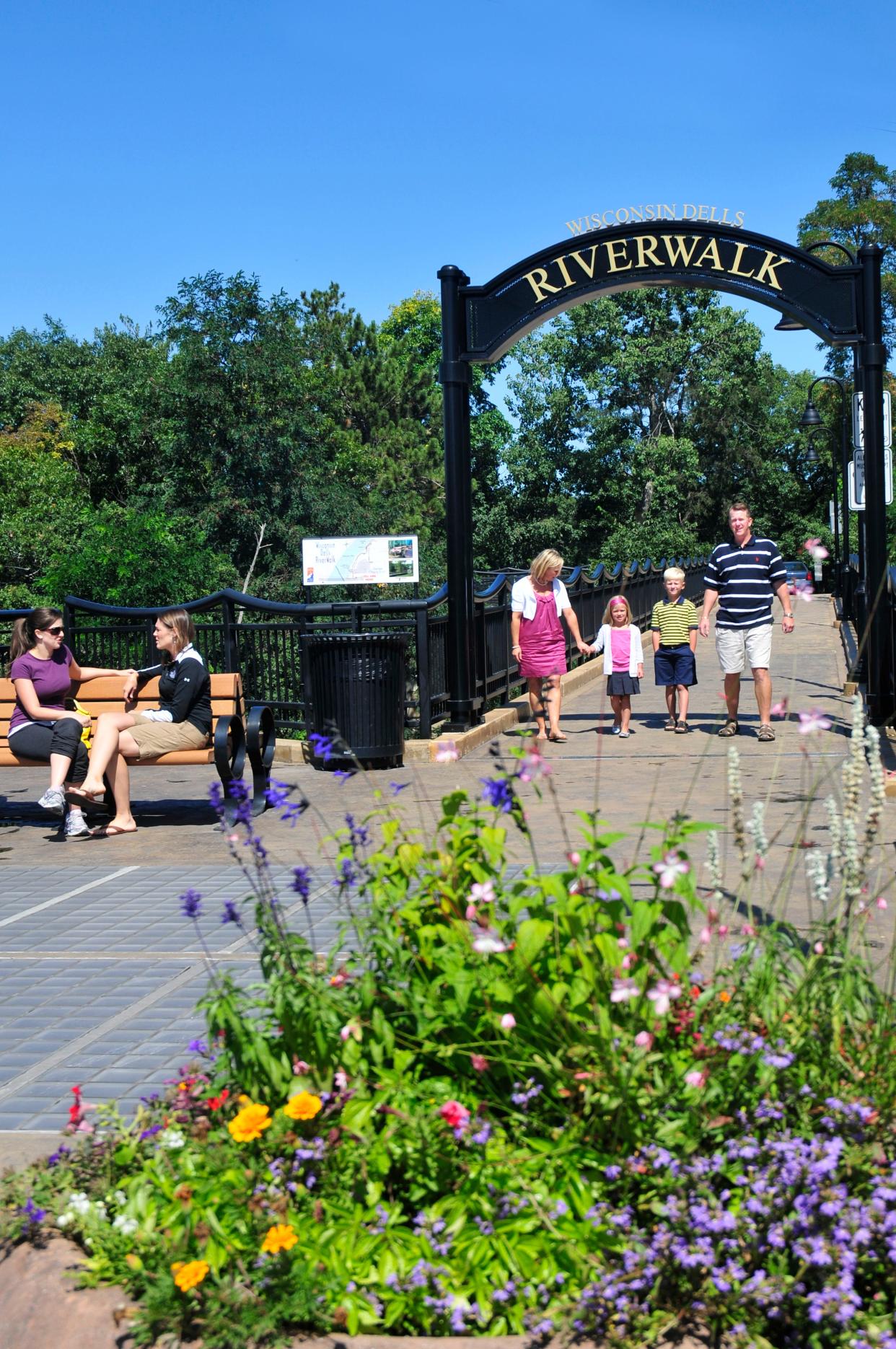 The paved, accessible Riverwalk in Wisconsin Dells stretches for about half a mile along the Wisconsin River.