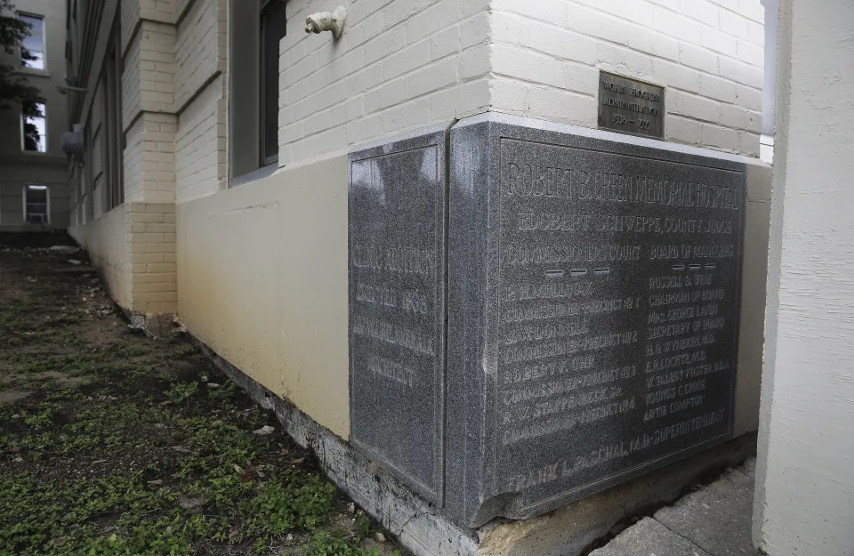 This May 24, 2021 photo shows a historical marker on the corner of the old Robert B. Green Hospital building, Bexar county's original hospital that has been standing for more than 100 years, in San Antonio. A strong earthquake that struck a remote area of the West Texas desert on Wednesday, Nov. 16, 2022, caused damage in San Antonio, hundreds of miles from the epicenter, officials said. University Health said Thursday, Nov. 17, that the historical building was deemed unsafe because of damage sustained from the quake. (Kin Man Hui/The San Antonio Express-News via AP)