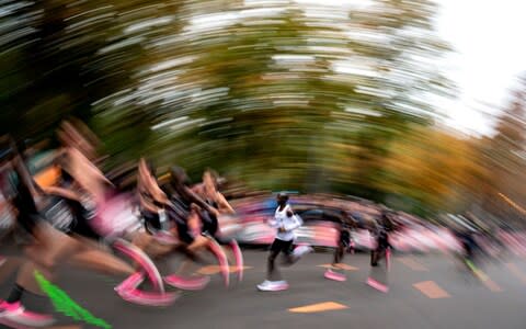 Eliud Kipchoge (C, in white), Kenyan marathon world record holder - Credit: CHRISTIAN BRUNA/EPA-EFE/REX&nbsp;