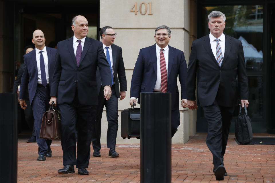 Members of the defense team for Paul Manafort, from left, Jay Nanavati, Thomas Zehnle, Brian Ketcham, Richard Westling, and Kevin Downing, leave federal court after closing arguments and jury instructions ended in the trial of the former Donald Trump campaign chairman, in Alexandria, Va., Wednesday, Aug. 15, 2018. (AP Photo/Jacquelyn Martin)