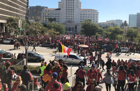 Teachers gather at Grand Park in Los Angeles for a rally after their union reached a deal with school district officials on a new proposed contract in Los Angeles, California, U.S., January 22, 2019. REUTERS/Alex Dobuzinskis