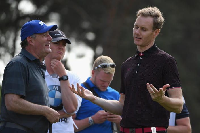 Piers Morgan chats with Dan Walker during the Pro Am for the BMW PGA Championship at Wentworth on May 23, 2018 in Virginia Water, England.  (Photo by Ross Kinnaird/Getty Images)
