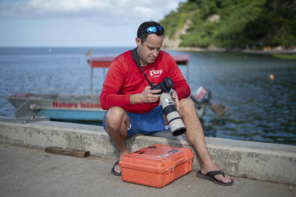 Shane Gero, a whale biologist and founder of the Dominica Sperm Whale Project, poses for a photo in Roseau, Dominica, Sunday, Nov. 12, 2023. The tiny island of Dominica announced on Nov. 13, 2023 that it is creating the world’s first marine protected area for one of earth’s largest animals: the endangered sperm whale. (AP Photo/Clyde K Jno-Baptiste)