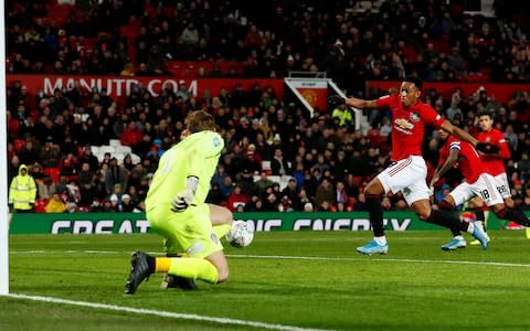 Anthony Martial scores Manchester United's third goal - Credit: Reuters