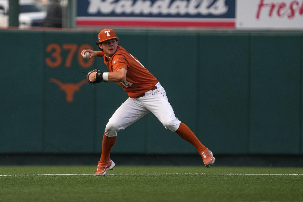 Texas Longhorns infielder Cade O'Hara (14) throws a ball to first during the game against San José State at UFCU Disch-Falk Field on Friday, May 12, 2023 in Austin.