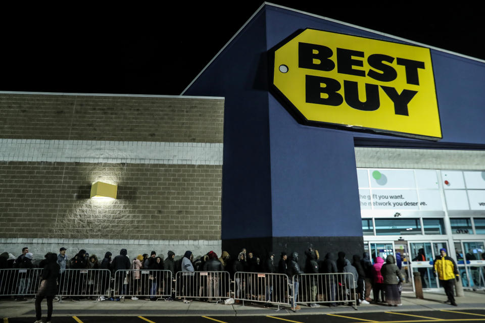 People wait in line to shop at Best Buy during a sales event on Thanksgiving day in Westbury, New York, U.S., November 22, 2018. REUTERS/Shannon Stapleton