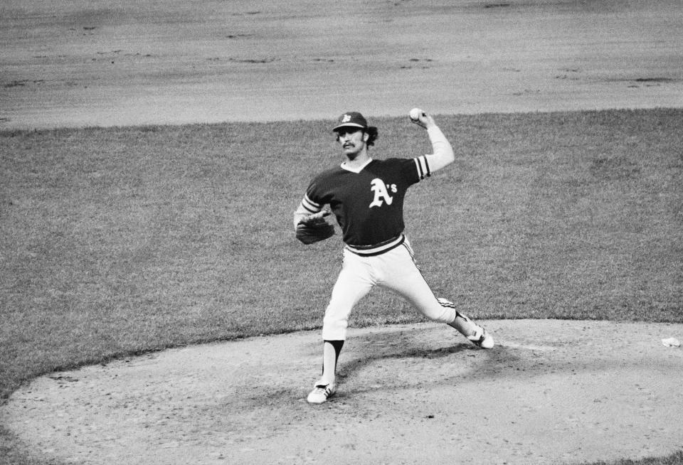 FILE - Oakland Athletics Pitcher Ken Holtzman gets the ball off in sixth inning of a baseball game against the New York Yankees at Yankee Stadium, June 1, 1973, New York. Holtzman, who pitched two no-hitters for the Chicago Cubs and helped the Oakland Athletics win three straight World Series championships in the 1970s, has died, the Cubs announced Monday April 15, 2024, on social media. (AP Photo/Dave Pickoff, File)