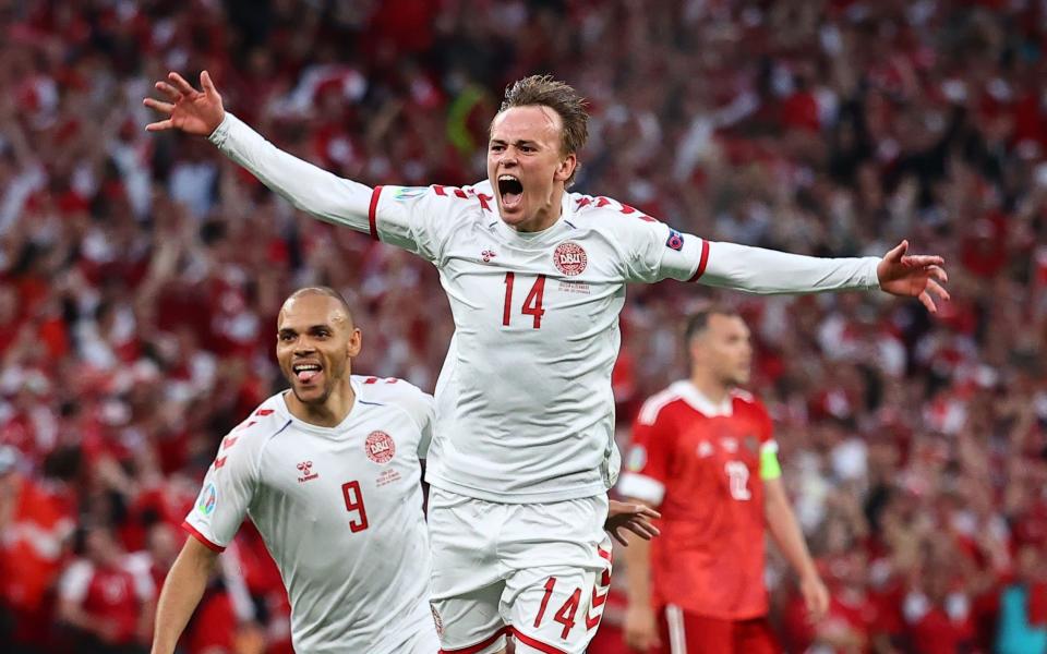 Denmark's Mikkel Damsgaard and Martin Braithwaite celebrate after the match - REUTERS