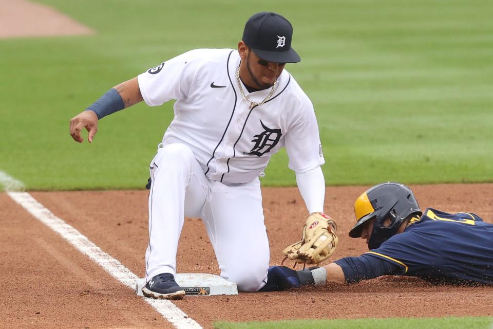 Brewers third baseman Luis Urias is tagged out trying to steal third base by Tigers third baseman Isaac Paredes in the second inning on Wednesday, Sept. 9, 2020, at Comerica Park.