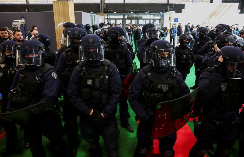 Farmers protest during the opening of Paris International Agricultural Show