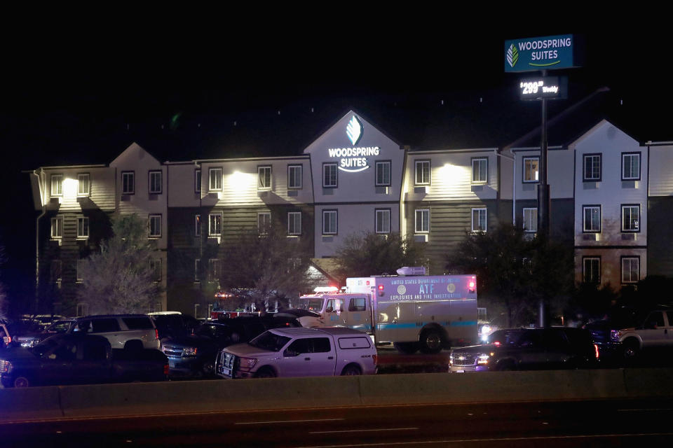 <p>Law enforcement officials investigate at the location where the suspected package bomber was killed in suburban Austin on March 21, 2018 in Round Rock, Texas. The 24-year-old suspect blew himself up inside his car as police approached the vehicle.(Photo: Scott Olson/Getty Images) </p>