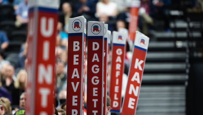 Signs displaying county names stand during the Utah Republican Party Organizing Convention at Utah Valley University in Orem on April 22, 2023.