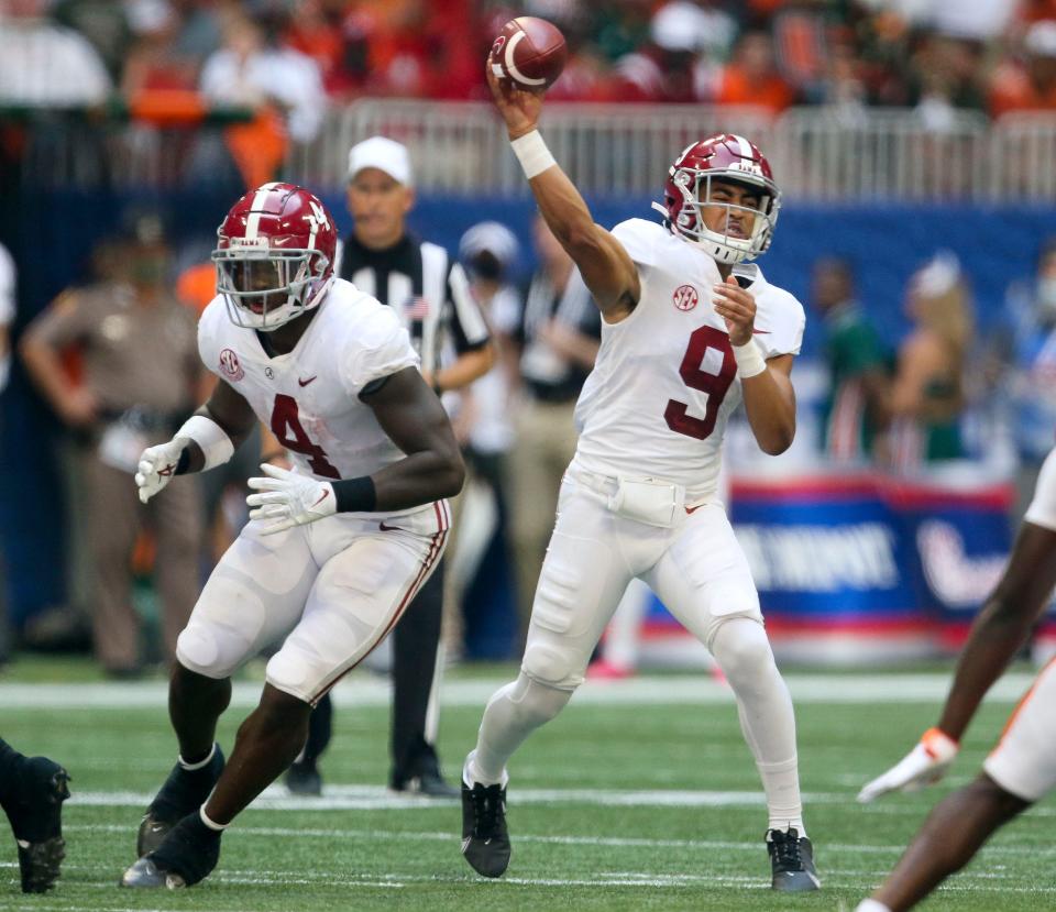 Alabama quarterback Bryce Young (9) throws with Alabama running back Brian Robinson Jr. (4) looking to block against Miami at Mercedes-Benz Stadium. Mandatory Credit: Gary Cosby-USA TODAY Sports