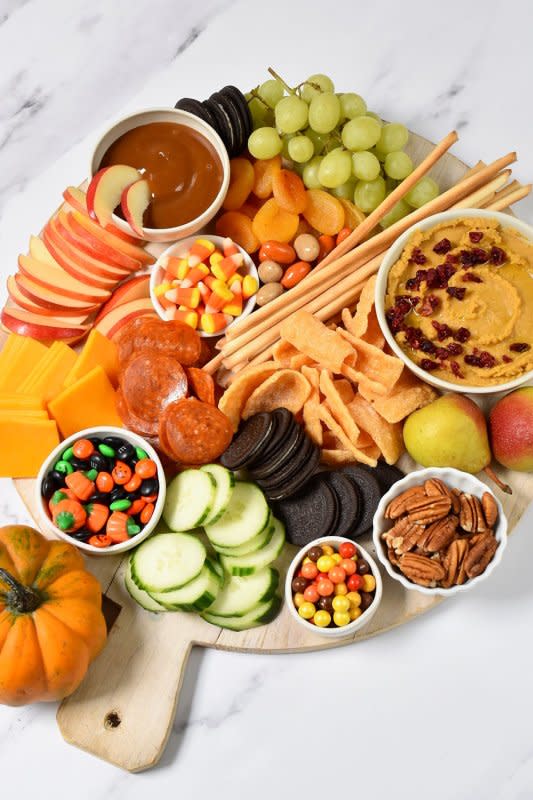 <p>Teresa Blackburn</p><p>Load it up with fruit, veggies, crackers or chips and a sweet-and-savory pumpkin spice hummus recipe, it's a frightfully festive snack board.</p><p><strong>Get the recipe: <a href="/1274566/parade/halloween-charcuterie-board-and-pumpkin-spice-hummus/" data-ylk="slk:Halloween Charcuterie Board;elm:context_link;itc:0;sec:content-canvas" class="link rapid-noclick-resp">Halloween Charcuterie Board</a></strong></p>