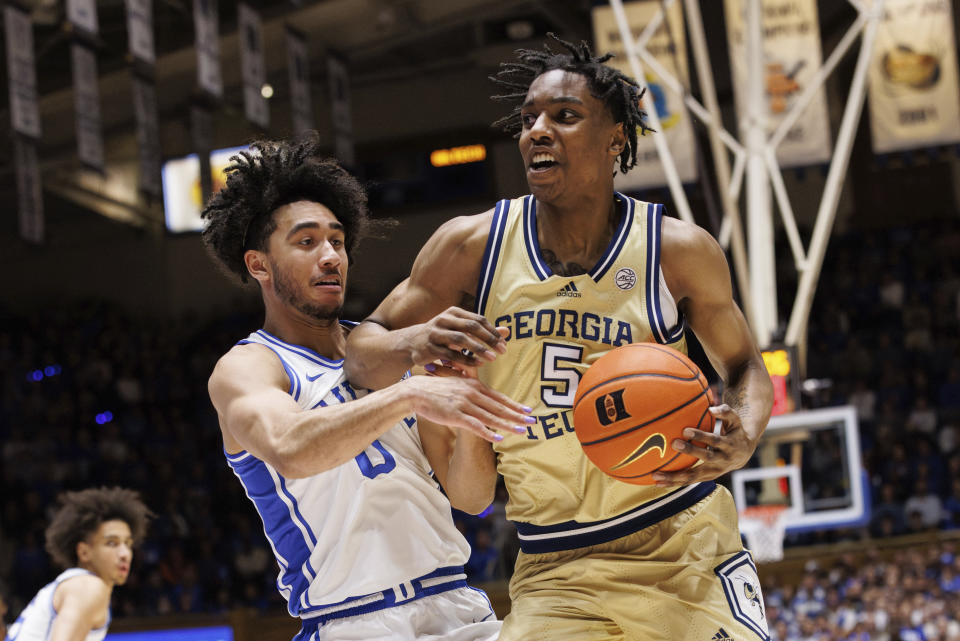 Georgia Tech's Tafara Gapare (5) drives as Duke's Jared McCain (0) defends during the first half of an NCAA college basketball game in Durham, N.C., Saturday, Jan. 13, 2024. (AP Photo/Ben McKeown)