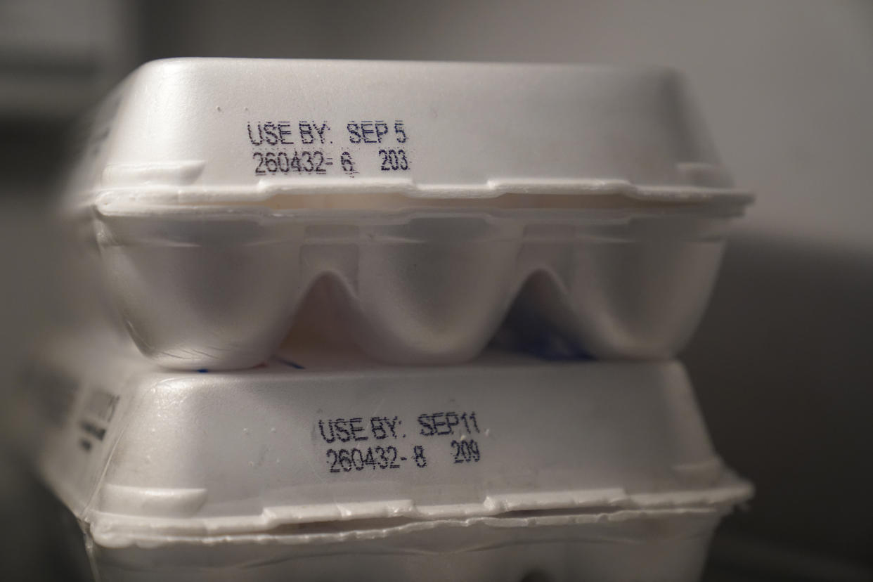 A "USE BY" date is stamped on two cartons of eggs, Sunday, Aug. 21, 2022, in Chicago. As awareness grows around the world about the problem of food waste, one culprit in particular is drawing scrutiny: “best before” labels. Manufacturers have used the labels for decades to estimate peak freshness. Unlike “use by” labels, which are found on perishable foods like meat and dairy, “best before” labels have nothing to do with safety and may encourage consumers to throw away food that’s perfectly fine to eat. (AP Photo/Charles Rex Arbogast)