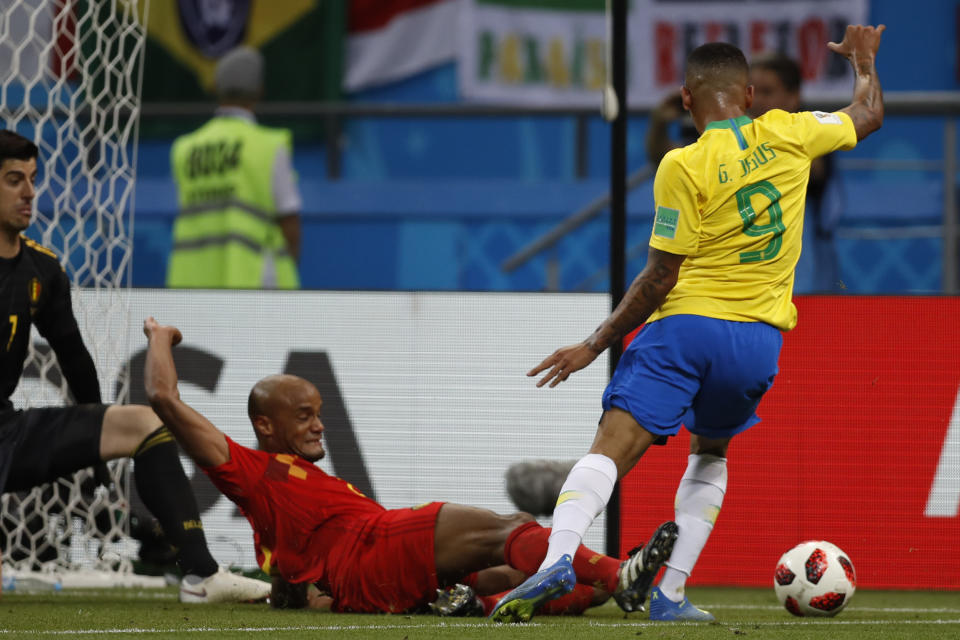 <p>Vincent Kompany slides and makes contact with Brazil striker Gabriel Jesus… </p>
