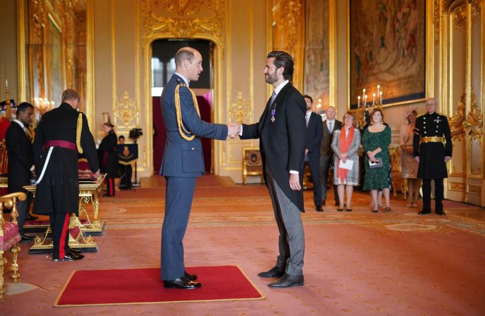 Prince William (left) with Jason Knauf. Alamy Stock Photo