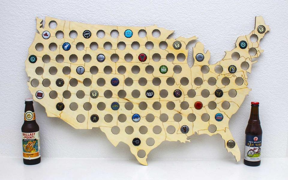 <p>Track travels with this beer cap map—a great way to showcase local brews sampled across the United States.</p> <p>To buy: <a rel="nofollow noopener" href="https://www.amazon.com/Giant-USA-Beer-Cap-Map/dp/B01F4I1IAI/ref=sr_1_1" target="_blank" data-ylk="slk:Amazon;elm:context_link;itc:0;sec:content-canvas" class="link ">Amazon</a>, $49.95</p>