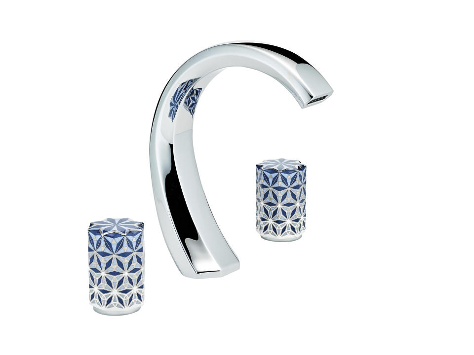 This photo provided by THG Paris shows a faucet from the Nihal collection. French architect Xavier Cartron named his Nihal collection for THG after a star in the Lepus constellation that symbolizes spring water. The porcelain taps come in sapphire, white, black or green. (THG Paris via AP)