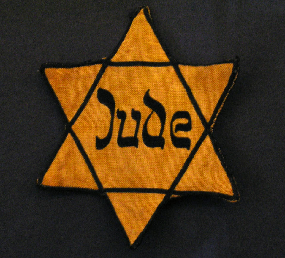 The yellow badge Jewish people were forced to wear during the Holocaust.  / Credit: Fine Art Images/Heritage Images/Getty Images