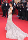 Eva Longoria kicked off this year's Cannes Film Festival in style when she hit the red carpet for the opening ceremony (and <a href="http://movies.yahoo.com/movie/moonrise-kingdom/" data-ylk="slk:"Moonrise Kingdom";elm:context_link;itc:0;sec:content-canvas" class="link ">"Moonrise Kingdom"</a> premiere) in a breathtaking Marchesa gown. Surprisingly, the dress -- which featured a 10 foot tulle train -- didn't overwhelm the diminutive "Desperate Housewives" alumna, who also donned a chic updo and simple diamond earrings. (5/16/2012)<br><br>Head over to <a href="http://www.whosay.com/EvaLongoria" rel="nofollow noopener" target="_blank" data-ylk="slk:Eva's WhoSay page;elm:context_link;itc:0;sec:content-canvas" class="link ">Eva's WhoSay page</a> for more pics of her Cannes red carpet prep!<br><br><a href="http://bit.ly/lifeontheMlist" rel="nofollow noopener" target="_blank" data-ylk="slk:Follow 2 Hot 2 Handle creator, Matt Whitfield, on Twitter!;elm:context_link;itc:0;sec:content-canvas" class="link ">Follow 2 Hot 2 Handle creator, Matt Whitfield, on Twitter!</a>