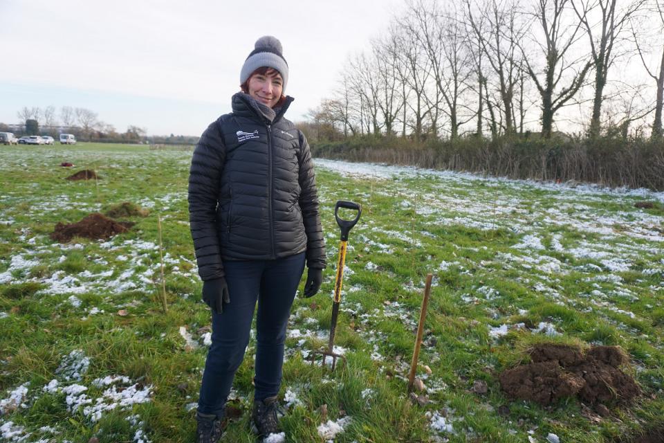 Sonia Lorenzo-Martin planting trees dedicated to the Queen (South Downs National Park Authority/PA)