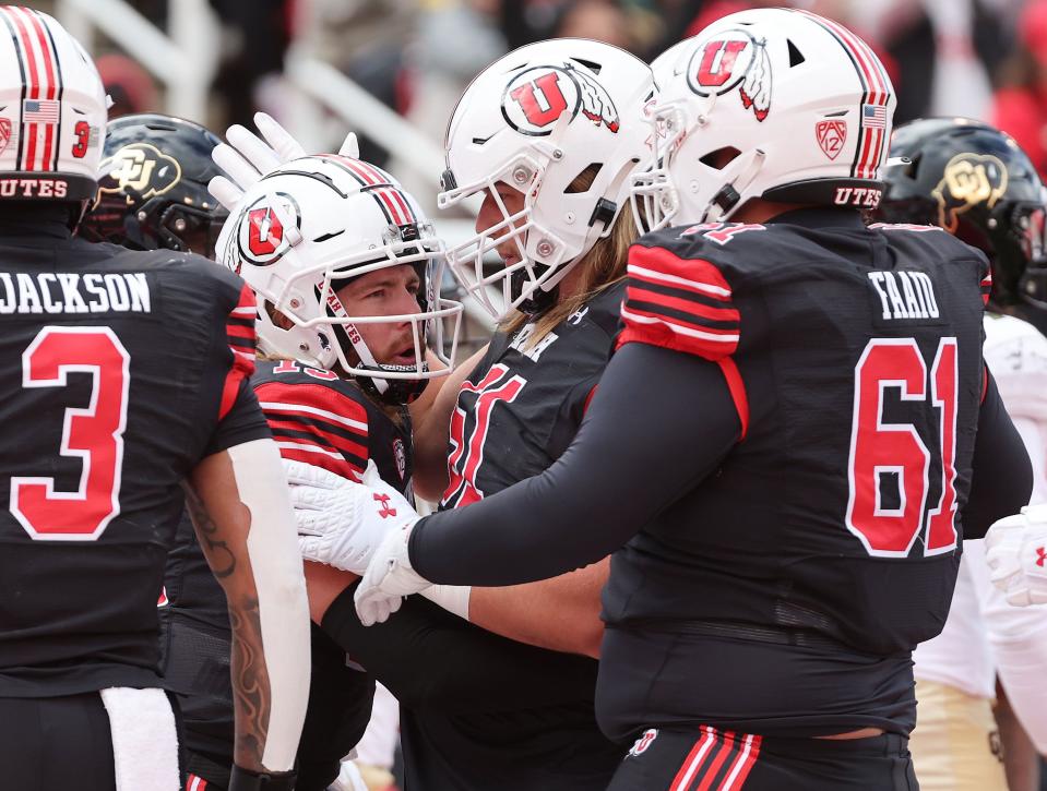 Utah Utes quarterback Luke Bottari (15) celebrates his touchdown against the Colorado Buffaloes in Salt Lake City on Saturday, Nov. 25, 2023. Utah won 23-17. | Jeffrey D. Allred, Deseret News