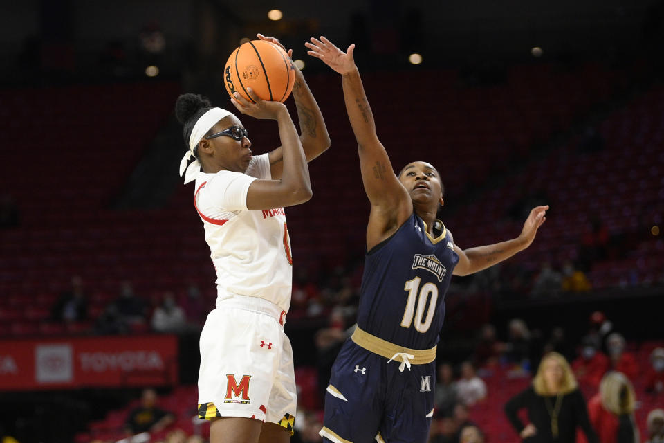 Maryland guard Shyanne Sellers (0) shoots against Mount St. Mary's guard Michaela Harrison (10) during the first half of an NCAA college basketball game Tuesday, Nov. 16, 2021, in College Park, Md. (AP Photo/Nick Wass)