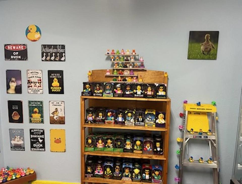 A shelf full of celebrity themed rubber ducks sits on display at the Rubber Duck Museum in Point Roberts, Wash.