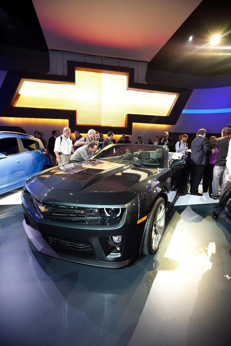 <h2 class="desc">Only in the rarefied world of auto shows would a 184-mph car seem just a touch slow, but that’s what Chevrolet faces with the 2013 Chevrolet Camaro ZL1 — until it drops its top.</h2>