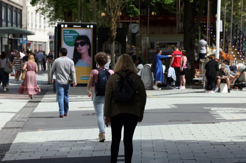 People walking on Cardiff Queen Street