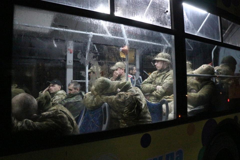 Ukrainian servicemen sit in a bus after leaving Mariupol’s besieged Azovstal steel plant (Copyright 2022 The Associated Press. All rights reserved.)