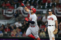 St. Louis Cardinals' Juan Yepez, left, celebrates after hitting a home run in the fifth inning of a baseball game against the Atlanta Braves, Monday, July 4, 2022, in Atlanta. (AP Photo/Butch Dill)