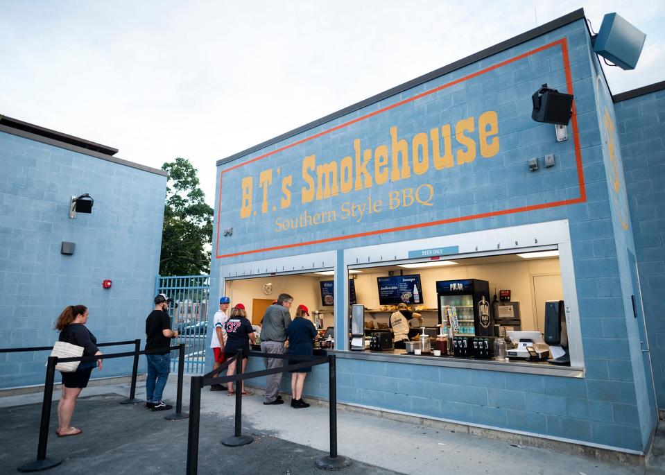 In a file photo, fans wait in line at B.T.'s Smokehouse during a WooSox game.