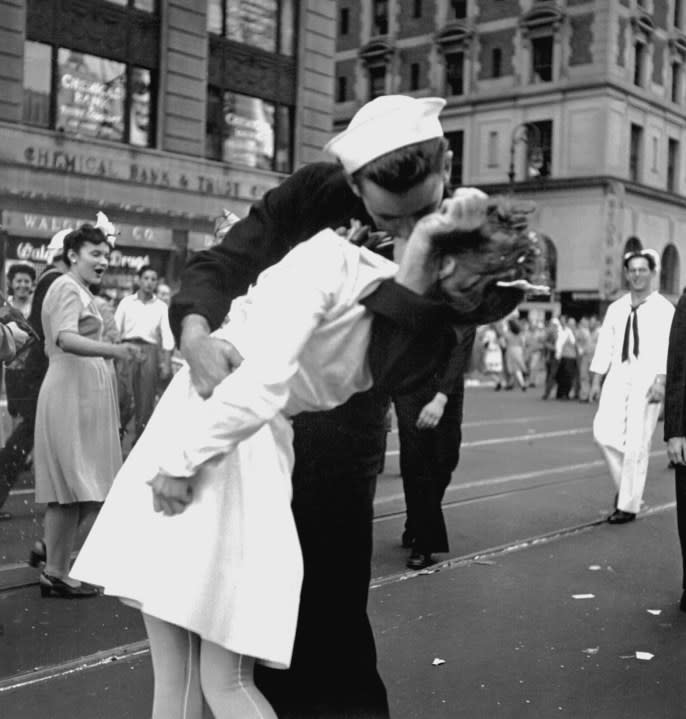 New York City celebrating the surrender of Japan.  They threw anything and kissed anybody in Times Square.  August 14, 1945. Lt. Victor Jorgensen. (Navy)
NARA FILE #:  080-G-377094
WAR & CONFLICT #:  1358