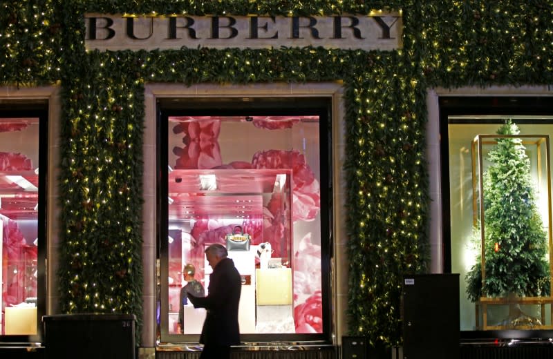 FILE PHOTO: Festive lights decorate the Burberry store on New Bond Street as shoppers do Christmas shopping in central London, Britain