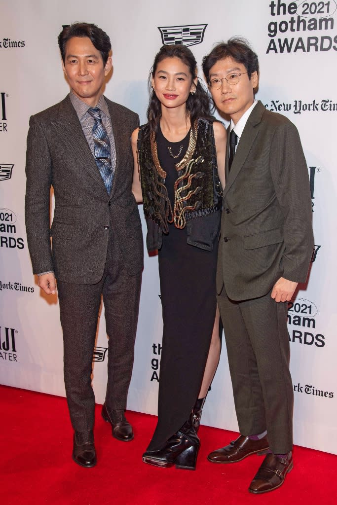 Lee Jung-jae, HoYeon Jung and Hwang Dong-hyuk attend the 2021 Gotham Awards. - Credit: Ron Adar / M10s / MEGA